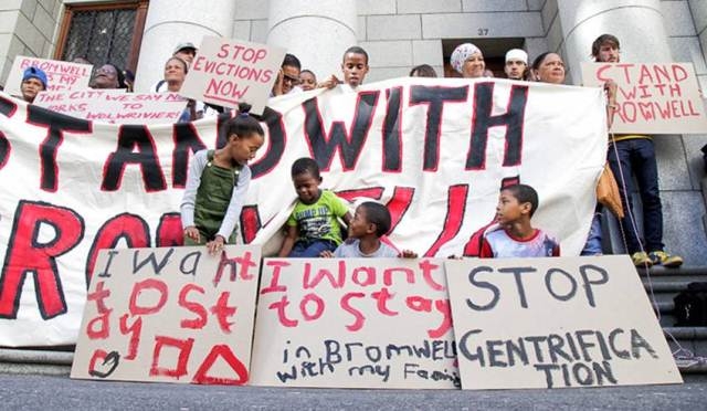 Bromwell Street residents protesting outside the Cape Town High Court. - Image by Ashraf Hendrick via Groundup.org.za