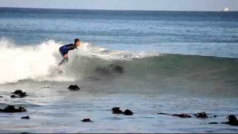 Brandon riding waves in Muizenberg in 2014 - YouTube Screengrab